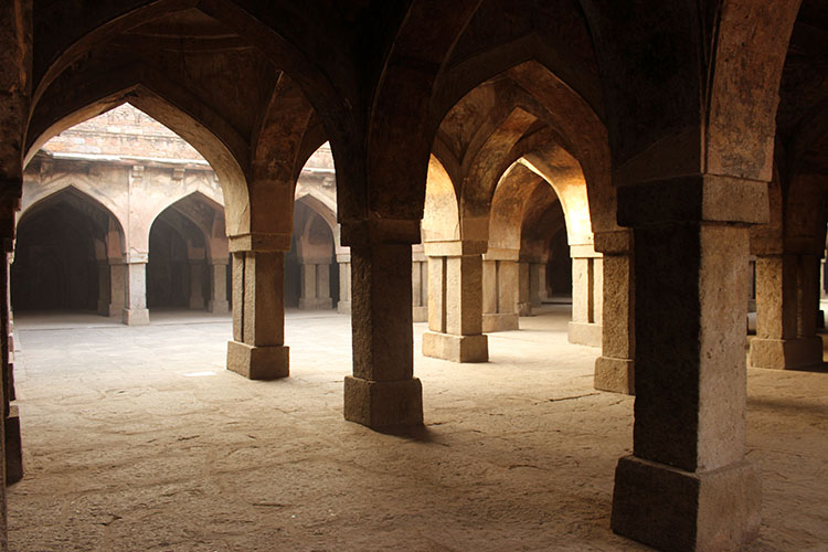 The deserted colonnades of the Khirki mosque